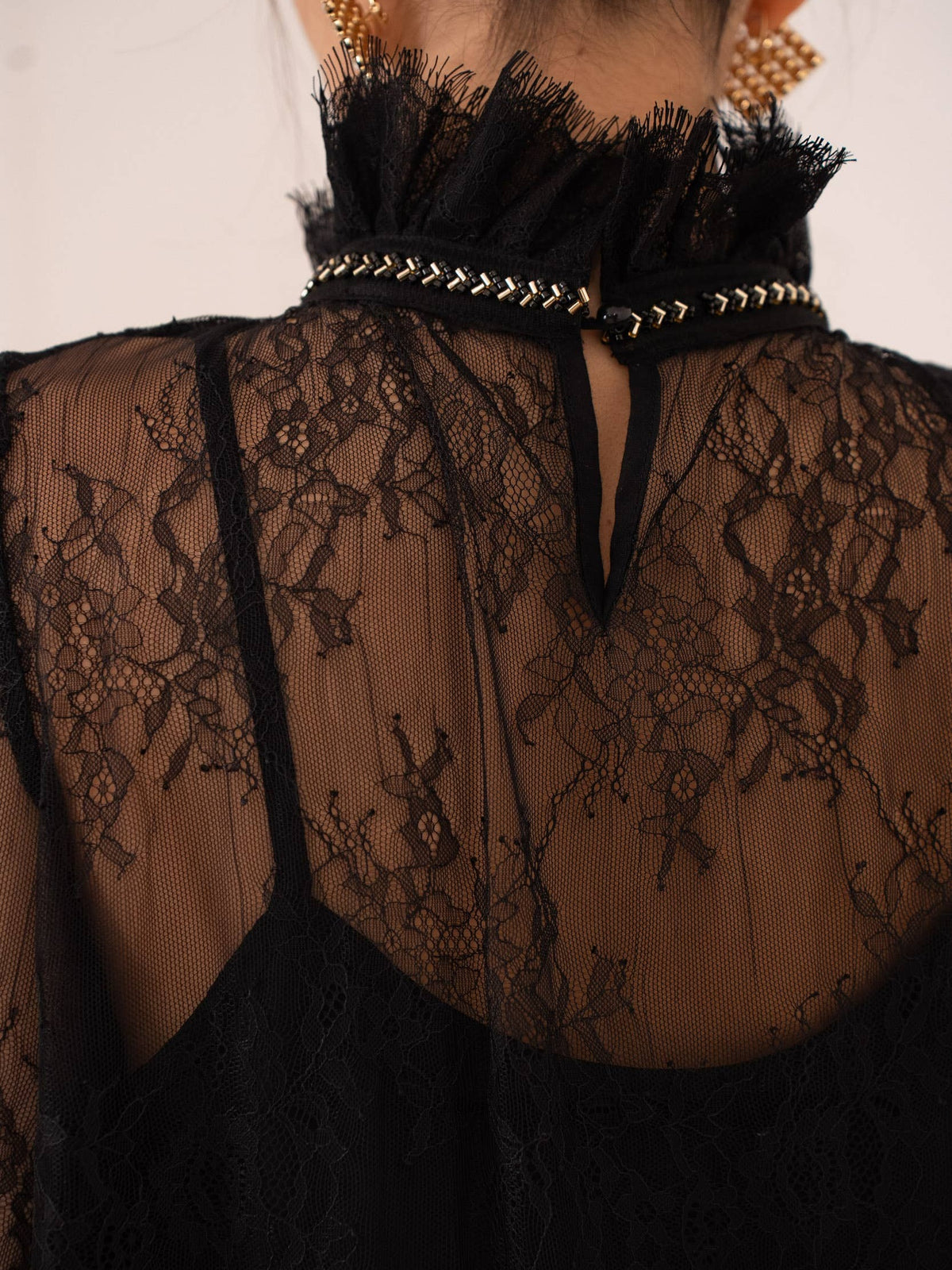 Blouse van kant & strass dorés