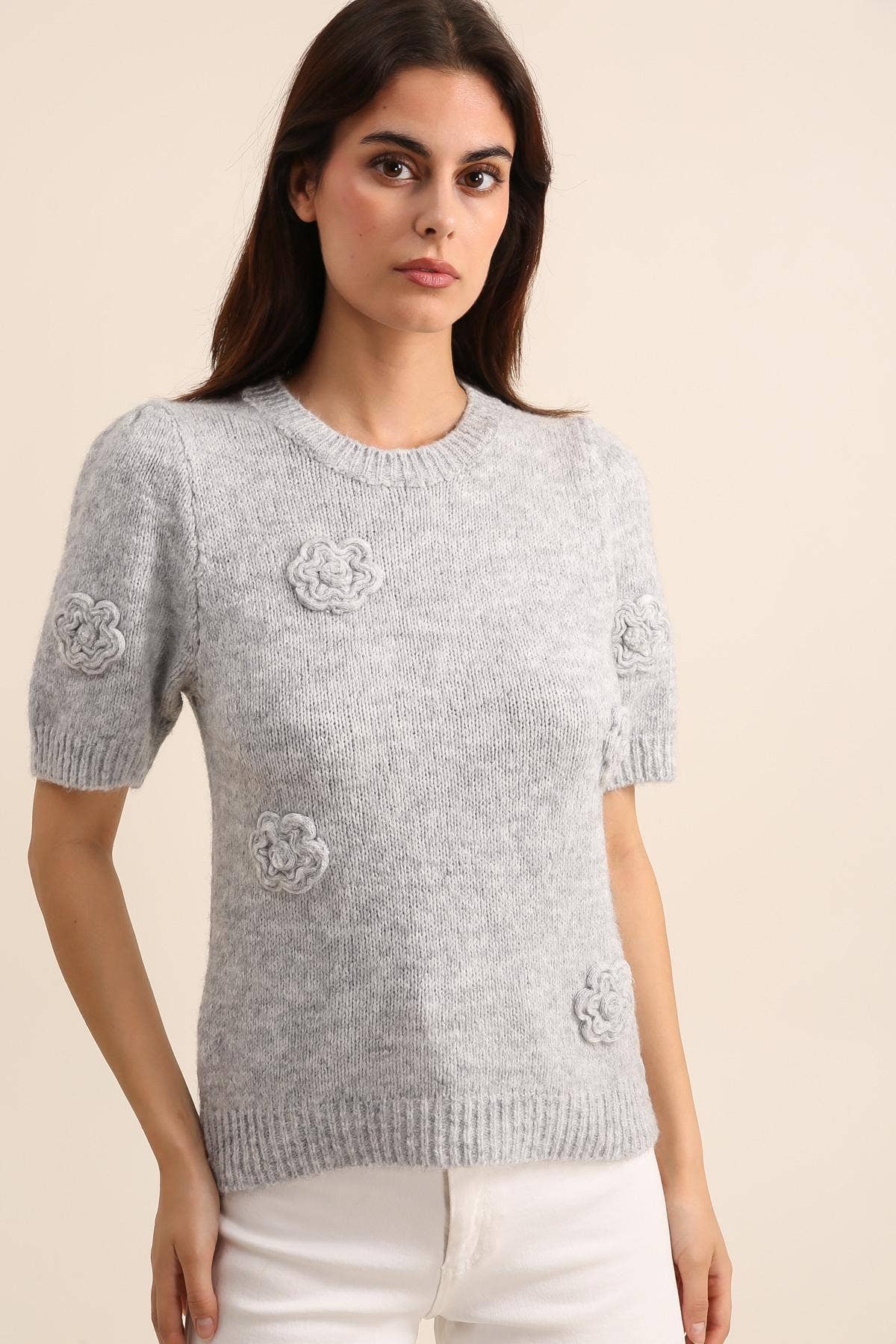 Gebreide trui met bloemen